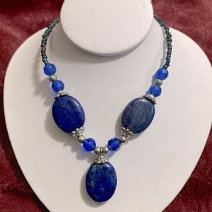 Pretty beaded necklace with speckled blue oval gemstones (Lapis?)